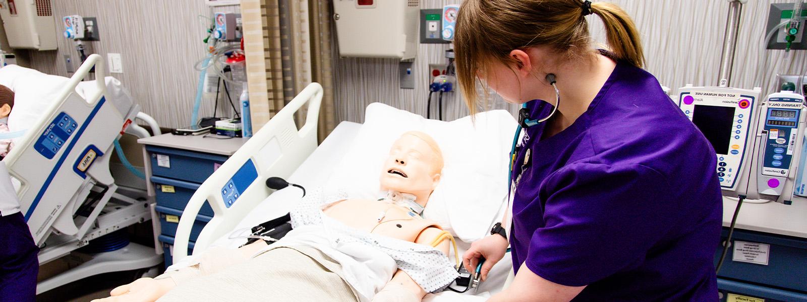 nursing students practice with IVs